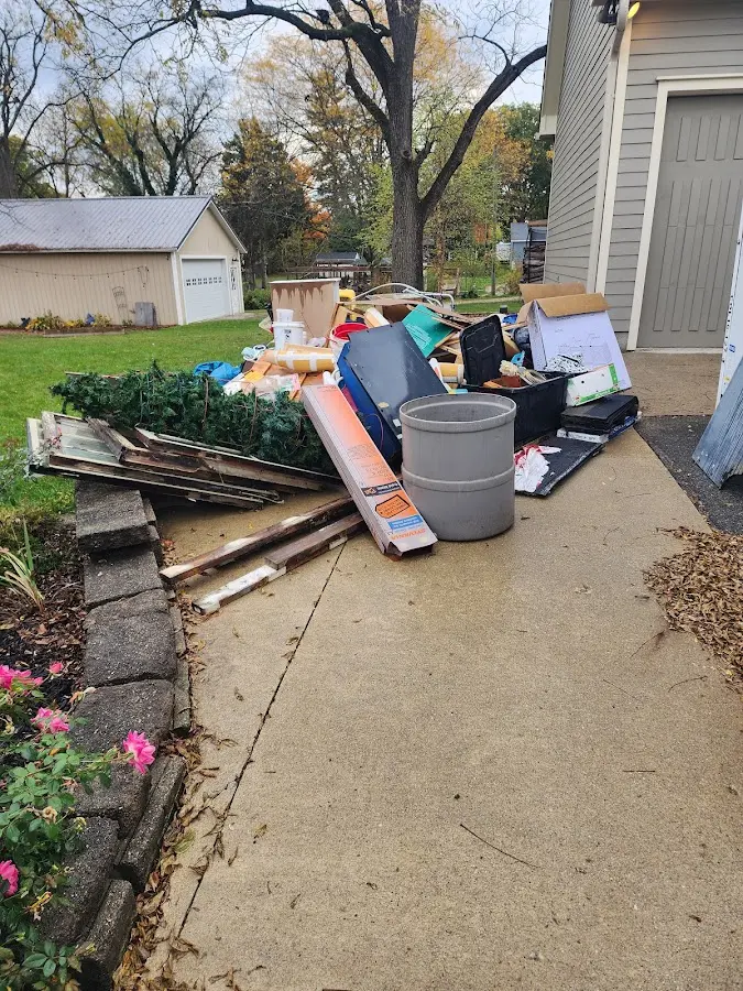 Dumpster being loaded with debris for Demolition Dumpster Rental in Lincolnshire